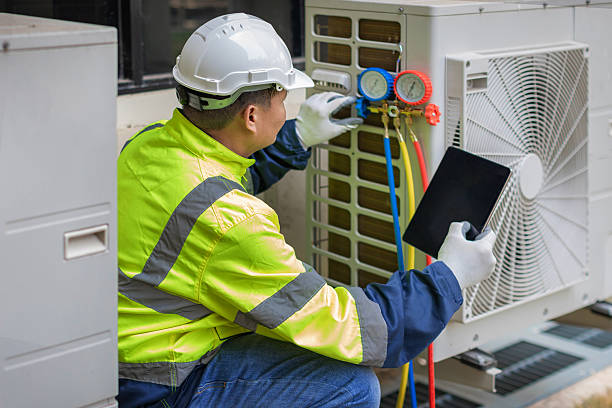 Professional Emergency Hvac technician working in Fuquay-Varina, NC